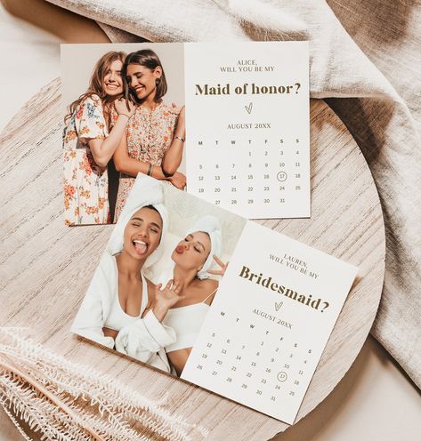 This Photo Bridesmaid Proposal Calendar + Maid of Honor Proposal Calendar cards Template This Maid Of Honor and Bridesmaid Proposal Card CANVA Template is fully editable and features a modern minimalist design. Edit all wording, font, font color, and the background color to match your event style. Simply upload your own photo and ask your bridesmaids to be a part of your special day in a fun and personable way. Not only is this a great way to ask your bridesmaids, it also makes for a perfect add Bridesmaid Proposal Diy, Bridesmaid Proposal Card, Bridesmaid Boxes, Bridesmaid Gift Boxes, Bridesmaid Proposal Cards, Bridesmaid Box, Will You Be My Bridesmaid, Be My Bridesmaid, Bridesmaid Proposal