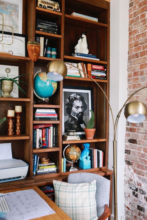 In an Arkansas Farmhouse, a Growing Family Enriches Their Community Eclectic Bookcase, Shelves Around Fireplace, Modern Eclectic Interior, Mid Century Modern Room, Community Design, Maximalist Interior, Basement Living Rooms, Bookshelves In Living Room, Small Bookcase