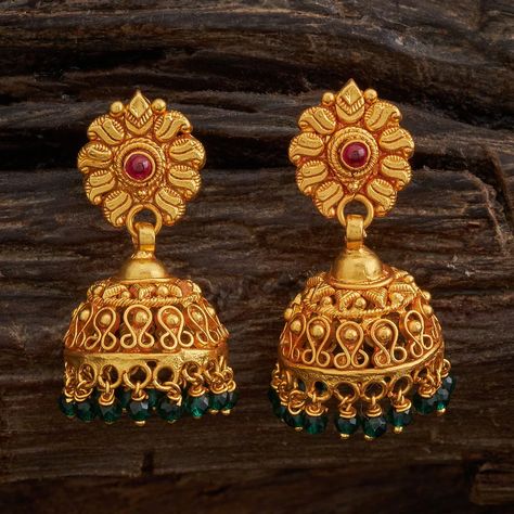 Big jhumkas have always been the trendsetters among contemporary jewellery in our Indian culture. We have an exquisite array of big jhumkas which will be the showstoppers at every event. Available in gold, silver and oxidised models, and also hand carved models in temple designs. Gold Earrings For Wedding, Jhumkas Gold, Beautiful Gold Earrings, Indian Jhumka, Kalyan Jewellers, Gold Jhumka, Gold Jhumka Earrings, Temple Design, Indian Culture