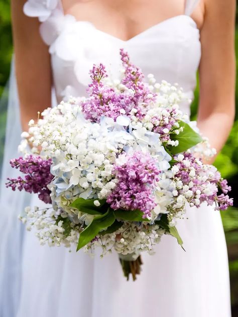 These bouquets will have you looking lovely in lilac. Ranunculus Wedding Bouquet, Lilac Wedding Bouquet, Lilac Bouquet, Purple Bridal Bouquet, Tulip Wedding, Purple Wedding Bouquets, Lilac Wedding, Rose Wedding Bouquet, White Bridal Bouquet