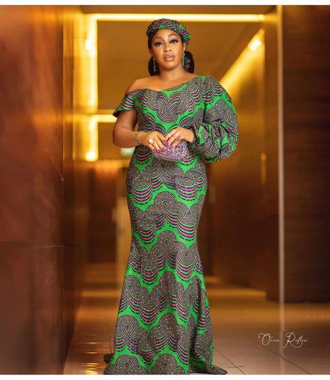 55 Beautiful Ankara Long Gown Styles Design 2020 | ThriveNaija A Shape Gown Ankara Long, A Shape Gown, A Shape Gown Ankara, Shape Gown, Long Ankara Gowns, Model Wax, Long Ankara Dresses, Gown Ankara, Latest Ankara Gown Styles