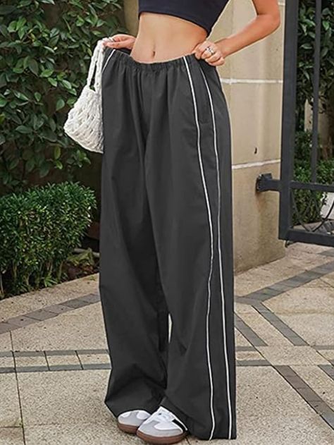 Design: Casual loose parachute pants for women, baggy sweatpants, ankle full length, wide leg trousers, straight leg pants, elasticized stretchy waistband for a flexible fit, simple but versatile, striking side stripes, welt side pockets, adjustable drawstring cuff, adding fashion to your overall dress Y2k Parachute Pants, Women Track Pants, Gym Sweatpants, Womens Streetwear, Sweatpants Streetwear, Clothing For Teens, Pants Streetwear, Y2k Pants, Baggy Sweatpants