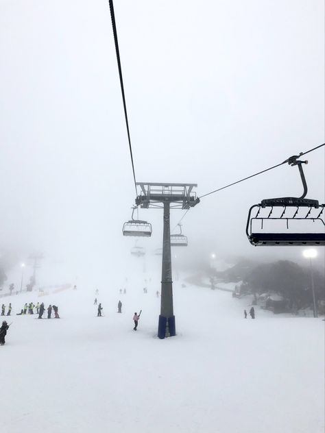 Views from the ski lift at Mt Buller. Snow covered ground, snowy dark sky, ski lift seen ahead. Ski Resort Aesthetic, Mount Buller, Ski Lodge Aesthetic, Snow Vibes, Melanie Harlow, Australia Snow, Lodge Aesthetic, Aesthetic Snow, Ski Aesthetic