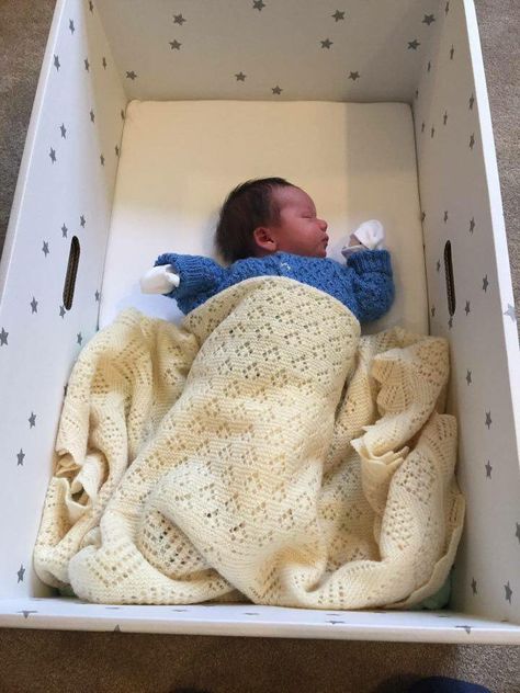 Pin for Later: The Surprising Reason Babies Everywhere Are Sleeping in Cardboard Boxes British Baby Box Baby Box, Cardboard Box, Bassinet, Parenting Hacks, Finland, Toddler Bed, Sleep, Parenting