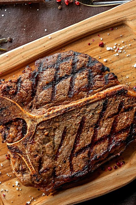 The classic T-Bone steaks include juicy meat on each side of the bone. It offers striploin – with its bold & beefy flavor profile on one side and tenderloin – with its decadent texture on the other. Meat Steak, T Bone Steak, Steak Cuts, T Bone, The Bone, Flavor Profiles, Meat Recipes, Steak, Grilling