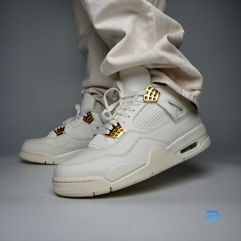 This Jordan 4 offers a luxurious take on a classic silhouette. The 'Metallic Gold' adds a touch of claass to any outfit, making it a standout addition to any sneaker collection. Get it today with the provided link! Metallic Gold Outfit, Jordan 4 Metallic, Gold Outfit, Jordan 4 Retro, Air Jordan 4 Retro, Nike Womens, Sneaker Collection, Stylish Shoes, Custom Shoes