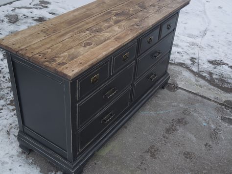 Beautiful dresser, painted black and lightly distressed.  Stained wood planked top.  The dresser is made by Basset.    I usually don't pain... Dresser Painted Black, Black Distressed Dresser, Black And Light Wood, Black Dresser Bedroom, Black Distressed Furniture, Light Wood Dresser, Distressed Dresser, Rustic Dresser, Rustic Bedroom Furniture