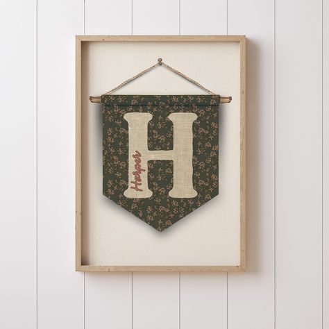 👉🏻 Please note: This listing is a high-resolution digital file for printable art. No physical product will be shipped. * ABOUT THE LISTING * This custom name vertical pennant flag banner is the perfect blend of vintage vibes and playful charm! Created with a timeless vintage floral background, this pennant is perfect for a nursery, big girl room, or as a cherished baby gift. The pennant features unique tangible texture that mimics the look of hand-crafted artwork on an aged paper backdrop, cre Nursery Flag Banner, Diy Bedroom Name Sign, Diy Name Pennant Flag, Folk Nursery, Flags For Room Decor, Vintage Baby Shower Theme, Embroidered Banner, Custom Pennant Flags, Room Decor Minimal