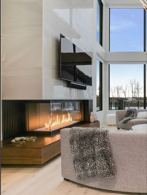 3 Sided Fireplace Ideas Modern, Modern Fireplace High Ceiling, Modern Livingrooms Design With Fireplace, Tall Tv Wall High Ceilings, Fireplace Ideas Modern Contemporary, Living Room With Natural Wood, Modern Corner Fireplace, Natural Wood Paneling, Home Entrance Wall