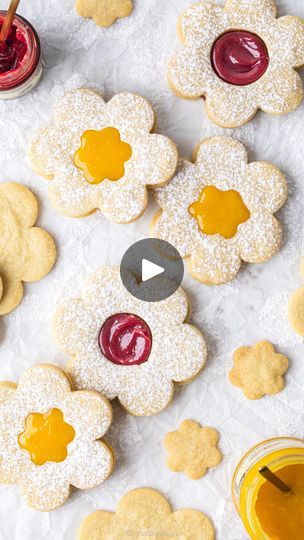 10K views · 1K reactions | NEW RECIPE 🌸 Putting a biscuit twist on my viral Flower Tartlets recipe 💛 Hopefully you’ll love these Flower Shortbread Biscuits just as much! Buttery, crumbly, melt-in-the-mouth shortbread, sandwiched together fruity jam and lemon curd 🍓 6 ingredients. Super simple. Perfect for summer (if it ever arrives 🫠).  
 
Comment ‘shortbread’ and I’ll DM you the recipe link 🔗 or find it here: Jessiebakescakes.com 🌺 Happy baking!  
 
 
 
 
#shortbread #shortbreadbiscuits #biscuitsandwich #lemoncurd #recipes #bakingideas #summerrecipes #flowercookies | Jessie | Baking Content Creator | Mentol · Yellow Flower Tartlets, Flower Shortbread, Tartlets Recipe, Biscuit Sandwich, Shortbread Biscuits, Flower Cookies, Lemon Curd, Super Simple, Summer Recipes