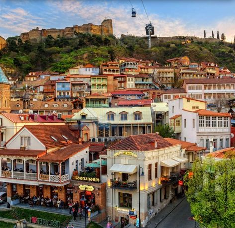 Old Town, Tbilisi, Republic of Georgia | Gondola in background up to Narikala Fortress Narikala Fortress, Republic Of Georgia, Tbilisi Georgia, Batumi, Going Home, Old Town, Georgia, Places To Visit, House Styles