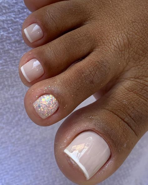 Step up your self-care game with these trendy pedicure ideas! From vibrant summer colors to elegant winter designs, discover endless inspiration to treat your feet right. For example, we love this classic French tip pedicure – it's so timeless! Pedicure Ideas For Summer, Trendy Pedicure, French Tip Pedicure, French Toe Nails, Classic French Tip, Pretty Pedicures, Pedicure Designs Toenails, French Pedicure, Pedicure Ideas