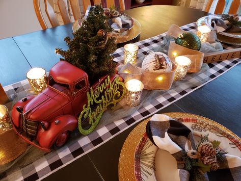 Red truck Christmas tablescape. Red Truck Christmas Party Ideas, Christmas Table Decorations Red, Christmas Tree Table Top, Red Truck With Christmas Tree, Truck With Christmas Tree, Christmas Tree Table, Christmas Party Ideas, Christmas Tree On Table, Red Truck Christmas