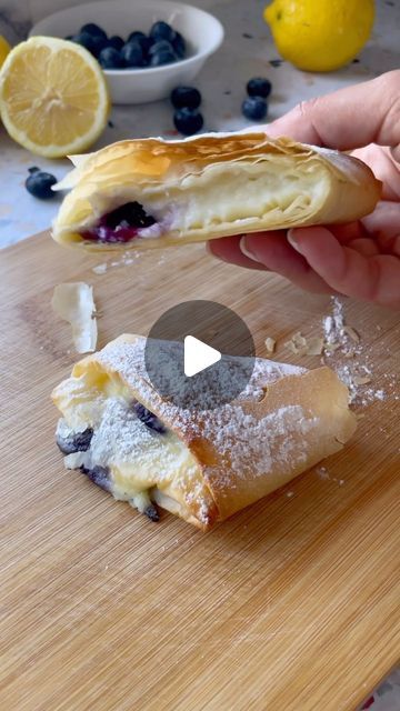 Antoniou Fillo Pastry on Instagram: "LEMON & BLUEBERRY BOUGATSA PARCELS. Bougatsa is one of our family’s favourite traditional Greek delicacies and we love enjoying it warm for breakfast or dessert. The addition of fresh blueberries and lemon zest to the creamy custard creates a wonderful burst of flavour. Watch along as Mary shows us how easy these delicious Fillo Pastry 
bougatsa parcels are to make.

You’ll find the recipe on the Antoniou Fillo Pastry website, there is a link in our Instagram bio. Here is the direct link which you can copy into your internet browser: 
https://antonioufillo.com.au/blog/recipes/lemon-blueberry-bougatsa-parcels

Video and recipe: @marys_kouzina for @antonioufillopastry 

#bougatsa #custard #greek #greekfood #greekbreakfast" Filo Custard Pie, Philo Recipes, Pastry Website, Bougatsa Recipe, Filo Pastry Recipes, Filo Dough, Greek Dessert, Phyllo Dough Recipes, Greek Breakfast