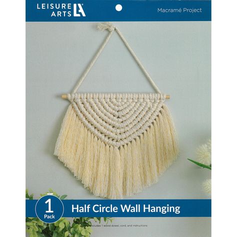 "Buy the Leisure Arts® Half Circle Hanging Macramé Kit at Michaels. com. Use this kit to create one half circular wall hanging with frayed tassel edges. Use this kit to create one half circular wall hanging with frayed tassel edges. Design is made using diagonal half stitch knots, overhand knots, and Lark's head knots, making this an easy project that is suitable for beginners. Details: Cream 12\" Includes wooden dowel and cord | Leisure Arts® Half Circle Hanging Macramé Kit | 12 | Michaels®" Macrame Half Circle, Edges Design, Macrame Wall Hanger, Overhand Knot, Current Design Trends, Art & Craft Kit, Hanging Macrame, Leisure Arts, Macrame Projects