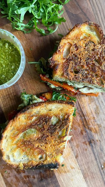 Lacey on Instagram: "Pesto Chicken Melt on Crispy Parm-Grilled Sourdough 🌿 Full recipe for this sandwich and the homemade basil pesto are both linked in bio 🌿 This sandwich was inspired by a sandwich on the menu at @kcsamericankitchen, the restaurant my parents owned and I worked at while I was in university. They’ve since sold the restaurant to two long standing employees and it’s as amazing as ever, so go check them out if you find yourself in Sonoma County, CA. The Pesto Chicken Melt at K Chicken Sandwich On Sourdough, Chicken Melt Sandwich, Sourdough Sandwich Recipes, Pesto Sandwich Recipe, Chicken Melt, Homemade Basil Pesto, Chicken Pesto Sandwich, Chicken Melts, Pesto Cheese