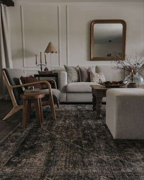 Dark Living Room Rug Ideas, Moody Living Room Carpet, Living Room With Dark Grey Rug, Dark Moody Minimalist Living Room, Masculine Cottage Living Room, Moody Living Room Light Couch, Moody Nordic Interior, White Walls Moody Living Room, Earthy Dark Living Room