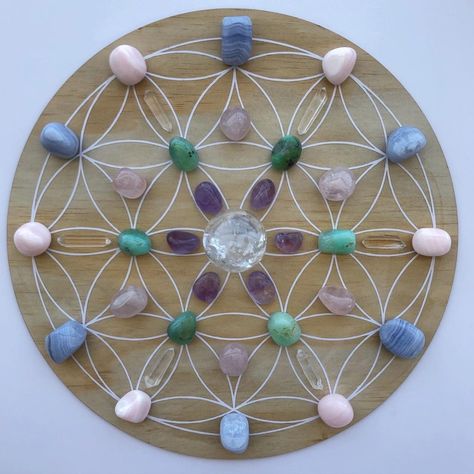 Crystal Gridding: A Step-by-Step Guide | The Alchemist's Kitchen Flower Of Life Crystal Grid, Crystals Healing Grids, Sacred Geometric Pattern, Get More Sleep, Crystal Healing Chart, How To Make Crystals, Sacred Geometric, Everything Is Energy, More Sleep