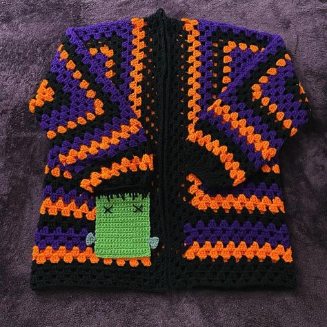 Time to ✨sprinkle✨ some Halloween on the feed with this awesome cardigan I made a couple years ago! 🎃🧟‍♀️🦇 Signature season colors + a Frankenstein pocket = the perfect holiday fashion 🖤 With the air getting chilly it’s time to pull it out of the closet! #crochet #halloween #crochetcardigan #halloweencrochet #crochetfashion #handmadecardigan #grannysquarecardigan #tistheseason #frankenstein #crochetwearable #october #sweaterweather Crochet Halloween, Out Of The Closet, Halloween Crochet, The Closet, Crochet Cardigan, Season Colors, Crochet Fashion, Frankenstein, Holiday Fashion