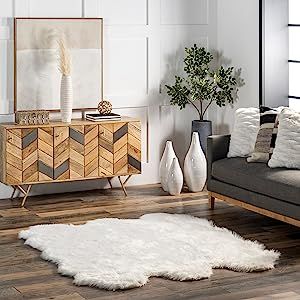 ✨ Experience ultimate coziness with the nuLOOM HJFL04A Deonna Sheepskin Shaggy Rug! 🐑🌟 This luxurious rug features a plush and soft faux fur texture that adds warmth and comfort to your space. Ideal for modern and Scandinavian interiors, it effortlessly enhances your home decor. 🏠❤️ Whether it's your living room, bedroom, or nursery, this rug provides a stylish and inviting atmosphere. Transform your floors with this trendy and cozy addition! 👌🛋️ Faux Hide Rug, White Shag Rug, Faux Sheepskin Rug, Laundry Room Rugs, Area Rug For Living Room, Solid Area Rugs, Solid Color Rug, Clearance Rugs, Scandinavian Furniture