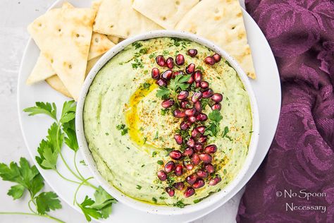 The holidays don’t have to be filled with fattening, heavy foods.  This Holiday Hummus is creamy, dreamy, festive and fabulous!!  Kick off your parties with a bowl full of this healthy arugula and roasted garlic white bean hummus! Heeeey-yo friends!  Happy less than 2 weeks until Christmas, Hanukkah and Kwanzaa! If you have followed this blog … Christmas Hummus, Holiday Hummus, Holiday Dip Recipes, White Bean Hummus, Sweet Potato Hummus, Bean Hummus, Roasted Garlic Hummus, Garlic Hummus, Simply Quinoa