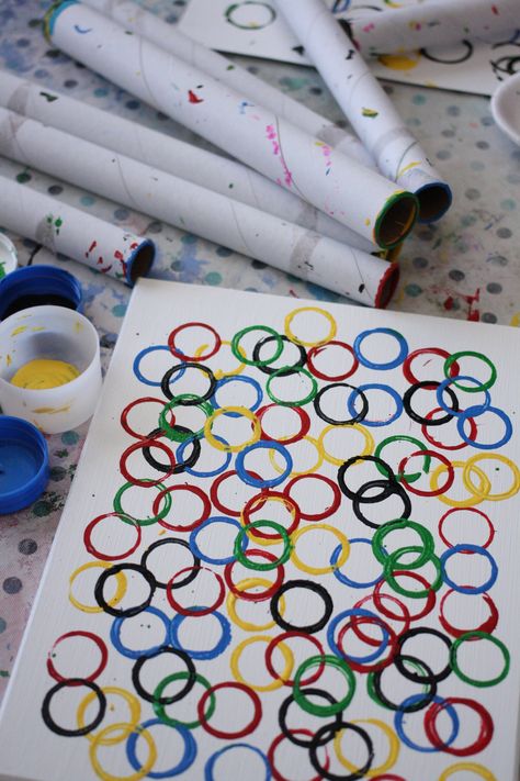 Happy Hooligans - Olympic Art for kids: we took a thrift shop painting, and upcycled it into a custom piece of art for our play room. Preschool Olympics, Olympic Ring, Olympic Games For Kids, Olympic Idea, Kids Olympics, Olympic Crafts, Olympics Activities, Happy Hooligans, Olympic Rings