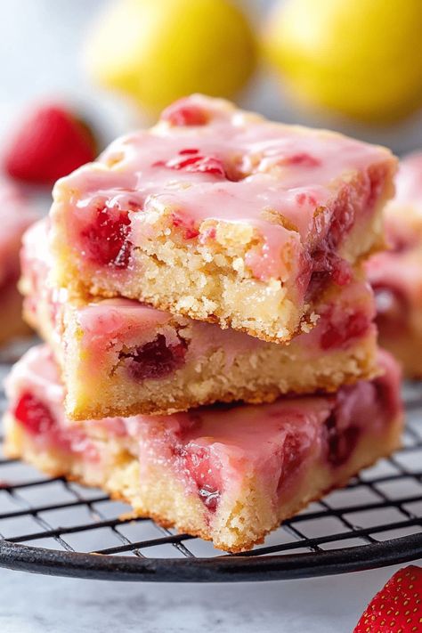 Strawberry Lemon Blondies are a delicious treat that beautifully balances the sweetness of strawberries with the zesty brightness of lemons. These soft, chewy bars are ideal for any occasion! Unlike cookies, bars and brownies are quicker to make and are the perfect dessert to bring to gatherings. This Strawberry Lemon Blondie recipe is bursting with Strawberry Lemon Blondes, Strawberry Lemon Bars Recipes, Leftover Strawberries What To Do With, Strawberry Lemon Brownies, Strawberry Blondies Recipe, Strawberry Lemon Bars, Strawberry Lemon Blondies, Lemon Blondies, Chewy Bars