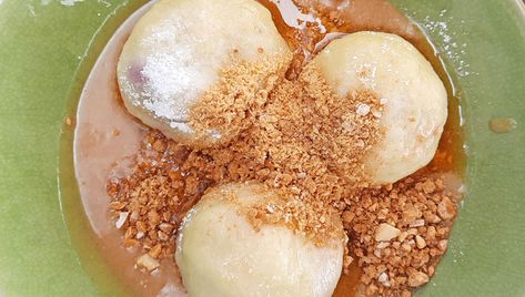 Czech Food - Traditional Plum Dumplings - Livingprague.com Plum Dumplings, Czech Food, Nightlife Club, Asian Side Dishes, Prague Old Town, Food Traditional, Czech Recipes, Old Town Square, Poppy Seeds