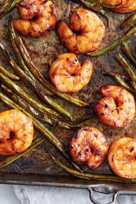 Sheet-Pan Gochujang Shrimp and Green Beans Recipe - NYT Cooking Shrimp Gochujang, Gochujang Shrimp, Korean Shrimp, Dry Fried Green Beans, Shrimp And Green Beans, Bean And Cheese Enchiladas, Broiled Shrimp, Cooking Shrimp, Onion Grilled Cheese