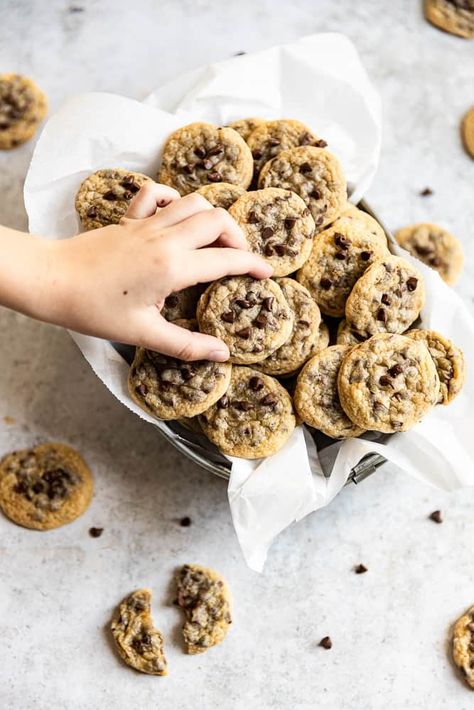 These mini chocolate chip cookies are so much fun to eat. These bite sized cookies are buttery and chewy and filled with mini chocolate chips. These are perfect for kids birthday parties or to make a dessert for a crowd. 60 Cookies, Dessert For A Crowd, Cookies Without Brown Sugar, Deceptively Delicious, Easy Impressive Dessert, Chocolate Orange Cookies, Mini Chocolate Chip Cookies, Chocolate Brownie Cookies, Bite Size Cookies