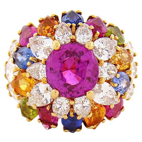 A beautiful 3-1/2 carat pink sapphire is the centerpiece of this important Domed ring surrounded by 16 diamonds totaling 2. Multi Gem Ring, Colored Sapphires, Edgy Accessories, Blue Sapphire Necklace, Precious Rings, Dior Jewelry, Diamond Fashion Rings, Jewels Rings, Dome Ring