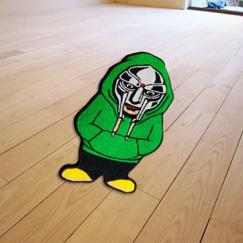 Elevate your living space with these stylish MF Doom area accent carpets 🎤🌟 Perfect for the living room, bedroom or home office. #MFDOOM #Hypebeast #Carpets #Tufting #HipHop #Rap 🏡✨ Mf Doom Rug, Doom Mask, Mf Doom Mask, Hypebeast Room, Mat Living Room, Living Room Area Rug, Mf Doom, Living Room Goals, Living Room Area