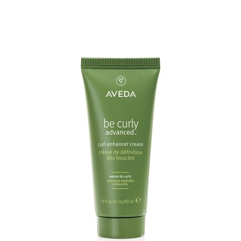 Protect and define with Aveda’s Be Curly Advanced™ Curl Enhancer Cream. The formula is designed to defend against frizz-inducing humidity and shape the natural curl pattern, encouraging soft, bouncy-looking results.  Thanks to its hydrating properties, the styling cream helps to minimise the look and feel of dryness, while visibly enhancing the hair’s natural shine. Aveda’s Pure-Fume™ aroma adds a touch of luxury to your beauty routine, refreshing the senses with a zesty blend of lemon, orange a Aveda Be Curly, Curl Enhancer, Tinted Gloss, Toning Shampoo, Afro Textured Hair, Waves Curls, Curl Cream, Signature Fragrance, Curl Pattern