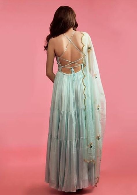 Beautiful Dress with stylish back pattern.  Detailing with dori and paired with net dupatta.  #gown #Embroidery #traditional #festival #amaracouture Backless Suit, Gown Embroidery, Indo Western Dresses, Embroidery Traditional, Dress Western, Indo Western Gown, Traditional Festival, Trendy Embroidery, Gold Wedding Dress