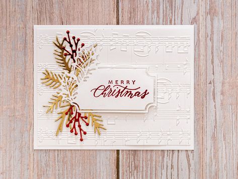 "Wish someone a Merry Christmas with this beautifully elegant red and gold Christmas card! **Please allow slight colour differences due to photography lighting** White embossed music notes are mounted on white cardstock. Various branch shapes are cut out in red and gold foil cardstock. \"Merry Christmas\" is stamped in red and 3D mounted on a holly frame. Inside, there is white cardstock with plenty of room to write your holiday wishes to its recipient. The finished card measures 10.8cm x 21.6cm White And Gold Christmas, Winter Karten, Music Card, Anna Griffin Christmas Cards, Red Gold Christmas, Poinsettia Cards, Joy Cards, Unique Christmas Cards, Handmade Christmas Card