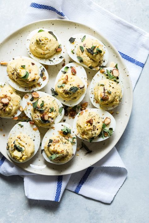 Deviled eggs with hummus on a plate Creamy Deviled Eggs, Feta And Olives, Egg Appetizer, Best Deviled Eggs, Fall Appetizers, Light Appetizers, Classic Appetizers, Egg Dishes, Deviled Eggs Recipe