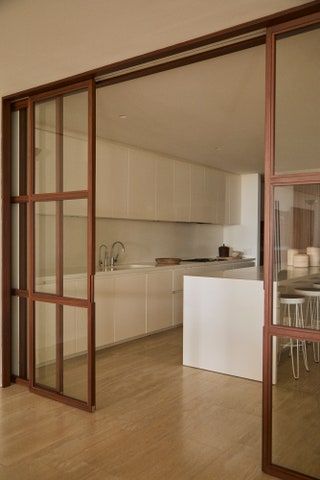 Zara Home Sofa, Kitchen Glass Door Design, Kitchen Sliding Doors, Concrete Stool, Partition Door, Housing Ideas, Misha Nonoo, Miami Houses, Office Guest Room