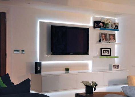 illuminated tv backboard Tv Cupboard Design, Bedroom Tv Unit Design, Tv Cupboard, Bedroom Wall Units, Tv Unit Design Modern, Pop Tv, Tv Unit Decor, Modern Tv Wall Units, Tv Unit Interior Design