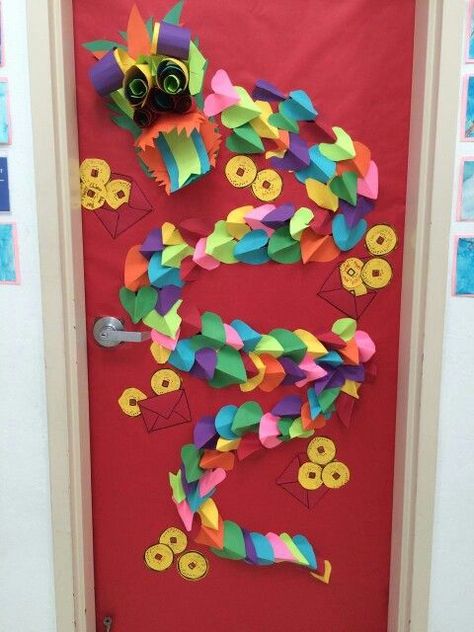 Chinese new year door idea I made up this year. The kids cut it hearts for Valentine's day and we made scales. Then they cut out money and made envelopes. They wrote new year luck on the coins. Ta da!! Classroom door success! Chinese New Year Classroom Decorations, Chinese Classroom Decorations, Chinese New Year Door Decoration, Lunar New Year Door Decoration, New Year Classroom Door, New Year Classroom, Classroom Door Ideas, Classroom Door Decorations, Chinese New Year Crafts For Kids