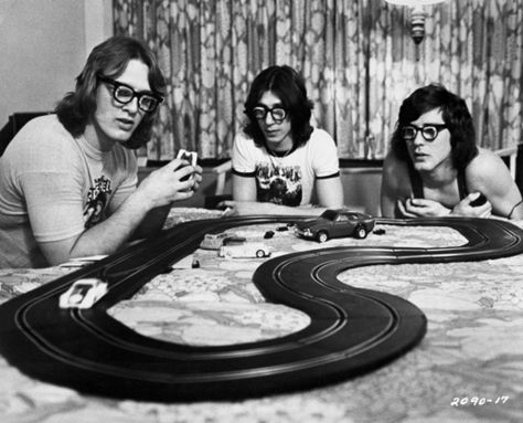 The "Hanson Brothers" race slot cars in their hotel room, from the hockey movie "Slap Shot". Slap Shot Movie, Hanson Brothers, Slap Shot, Slot Racing, Slot Car Racing, Sports Movie, Hockey Fans, Hockey Teams, Slot Cars