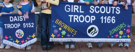 Girl Scout Parade Banners with personalized felt butterflies for each girl in the troop Felt Butterflies, Parade Banner, Daisy Ideas, Brownie Scouts, Holiday Parades, Girl Scout Daisy, Girl Scout Activities, Daisy Scouts, Daisy Girl Scouts