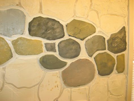 DIY Fake Stone Wall—Cheap and Fun! | Dengarden Rock Wall Diy, Diy Stone Wall Interior, Faux Stone Wall Interior, Make Fake Rocks, Fake Rock Wall, Diy Faux Rocks, Faux Rock Walls, Fake Stone Wall, Diy Stone Wall