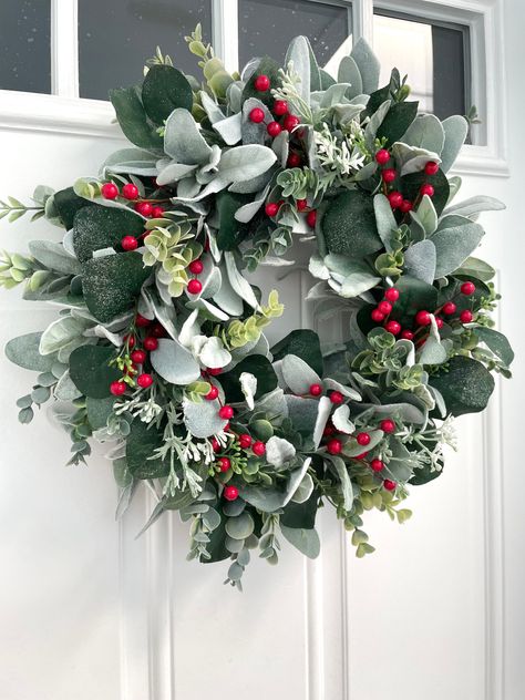 red berry wreath, winter lambs ear wreath, fall eucalyptus wreath, eucalyptus front door wreath, frosted eucalyptus wreath, valentine wreath Welcome your guests, family, and friends with this beautiful wreath! This wreath is made on a grapevine wreath, using red berries, frosted eucalyptus, lambs ear, small white berries, and green eucalyptus. Wreaths also make great gifts for mother's day, housewarmings, birthdays, bridal showers, weddings, Christmas, and more! This wreath is available in 3 sizes: - 15 inches ( pictures 1-2/ video) - 19 inches (pictures 4-10) - 23 inches (picture 3) The diameter is measured from leaf tip to leaf tip. **All wreaths are made with high-quality faux florals and greenery. Greenery and berries may vary due availability but always look pretty. Indoor use is reco Lambs Ear Wreaths, Eucalyptus Wreath Christmas, Lambs Ear Christmas Wreath, Eucalyptus Christmas Wreath, Diy Christmas Wreaths For Front Door, Fall Eucalyptus Wreath, Red And Green Christmas Decor, Winter Wreath Ideas, Christmas Eucalyptus