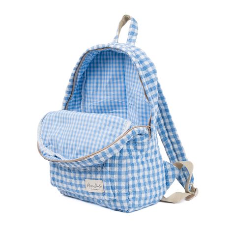 Our Azure Backpack is a charming and stylish bag designed to carry all your essentials with a timeless flair. The quilted exterior is made from a beautiful blue gingham material, complemented by a matching gingham interior. Designed for practicality, this backpack features a convenient exterior pocket for easy access to your essentials on the go. Inside, discover another dedicated pocket for added organization, ensuring that your belongings are always at your fingertips. Ideal for daily commutes Gingham Interior, Mini Makeup Bag, Cute Luggage, Large Makeup Bag, Vanity Bag, Summer Gifts, Cute Backpacks, Blue Backpack, Pretty Bags