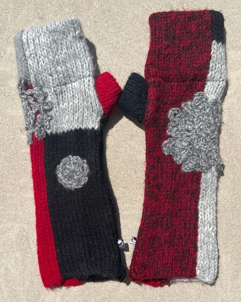 Long and cozy thick fun arm warmer texting gloves. Crochet snowflakes adorn these black, gray and red beauties.  There is a differnet look that can be had depending upon which side is worn up. Thumbs are doubled for added warmth. the finger flaps also doubled.  No allergies here too as they are all acrylic. See pics.    Will fit average to large hands.  I've been making upcycled sweater knits for over a decade selling them via craft shows.  Each pair is individually designed and completed by me.  Cold wash and lay flat to dry.  Will fit a small or average hand. Knits Stretch! Free Shipping USA mainland. Gloves Crochet, Upcycled Sweater, Texting Gloves, Craft Shows, Upcycle Sweater, Crochet Snowflakes, Mitten Gloves, Arm Warmers, Allergies