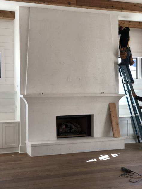 8ft Ceiling Fireplace, Plaster Fireplace With Tv Above, Stucco Corner Fireplace, Tapered Fireplace Chimney, Corner Plaster Fireplace, Cement Hearth Fireplace, Plaster Fireplace With Hearth, Simple Gas Fireplace Ideas, Plaster Fireplace With Tv