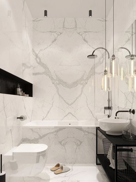 Some homeowners may prefer to make a simple bathroom because they don’t want to put much stuff inside. However, not many people use marble to decorate their bathroom because they may think that a bathroom does not really need a luxurious touch. While in fact, a bathroom is one of the core parts of the house where you start your daily activity or simply just for chilling after a rough day. Marble, whether black or white, creates a different feeling that will also affect your mood. Ensuit Bathroom, Modern Marble Bathroom, Small Ensuite, Marble Walls, Bathroom Colour, Toilette Design, Luxury Bathroom Master Baths, White Bathroom Tiles, Bathroom Ensuite