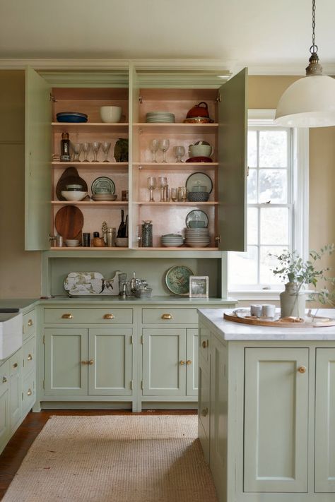 Traditional kitchen with sage green cabinets, adding a calm and inviting atmosphere to the space. White Sage Cabinets, Floristry Workshop, Green Kitchen Cabinets Ideas, Sage Green Kitchen Cabinets, Brass Kitchen Hardware, Green Kitchens, Sage Kitchen, Kitchen Cabinets Ideas, Kitchen Favorites