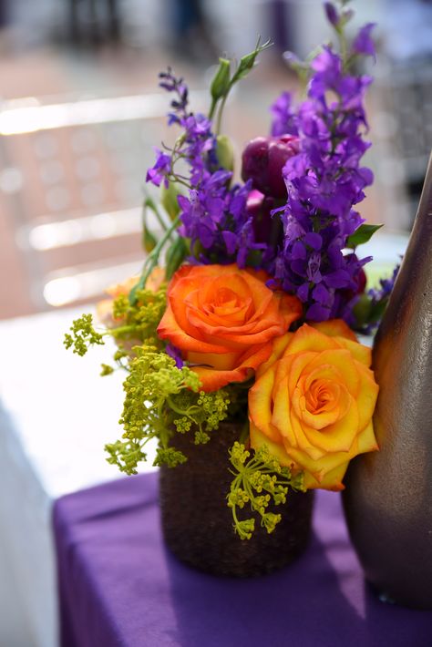 Orange And Purple Fall Decor, Orange And Purple Floral Arrangements, Purple And Orange Flower Arrangements, Purple And Orange Wedding Decorations, Orange And Purple Party, Orange And Purple Wedding Theme, Purple Thanksgiving, Purple Orange Wedding, Purple And Orange Wedding