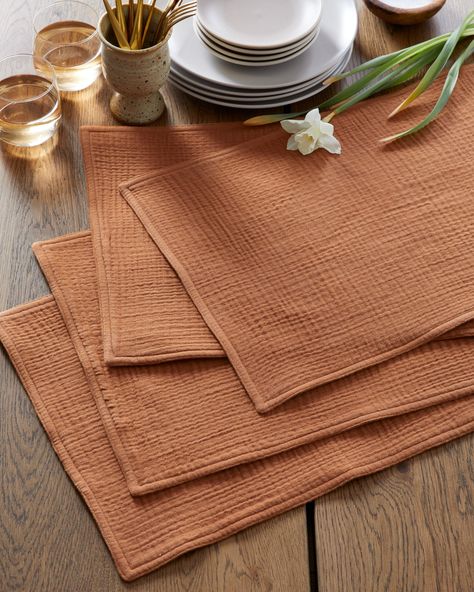 Made from 100% organic cotton, these placemats are not only eco-friendly but also incredibly soft and gentle to the touch. The natural texture of the gauze fabric adds a unique touch to your table setting, and the simple yet elegant design complements any style of dishware. These placemats are also versatile, perfect for use at any meal or occasion, from casual picnics to formal dinners. With their durable construction, these placemats are designed to last, so you can enjoy them for years to com Olive Green Placemats, Muslin Table Runner, Japandi Table Setting, Placemat Photography, Placemats Ideas Dining Rooms, Simple Placemats, Easy Placemats, Organic Table, Modern Placemats